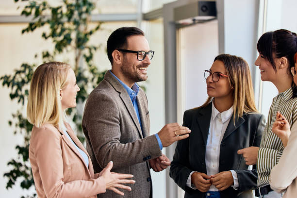 Happy team members collaborating in an office environment